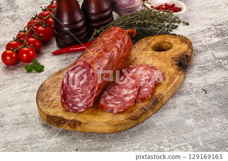 Italian pork Salchichon sausage with slices Italian pork Salchichon sausage with slices 129169163