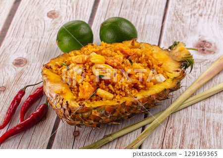 Seafood fried rice in pineapple half Seafood fried rice in pineapple half 129169365