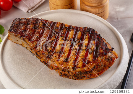 Grilled pork steak with bone 129169381