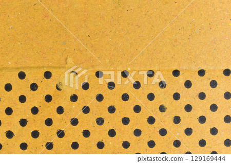 spotted cardboard box texture background 129169444