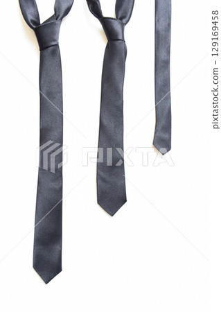 black necktie isolated on white background, father day concept and business style black necktie isolated on white background, father day concept and business style 129169458