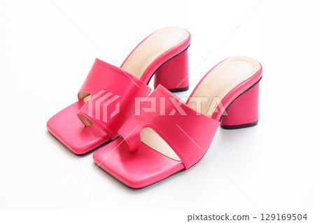 beautiful pink leather heel shoe isolated on white background 129169504
