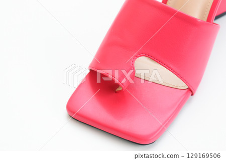 beautiful pink leather heel shoe isolated on white background beautiful pink leather heel shoe isolated on white background 129169506
