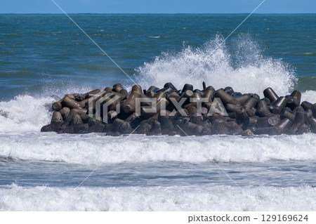 Surging waves 129169624