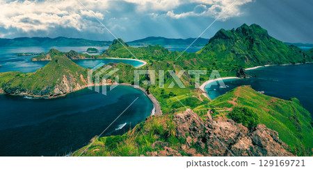 aerial view over the beautiful sunset in the mountains, madeira island, portugal. aerial view over the beautiful sunset in the mountains, madeira island, portugal. 129169721
