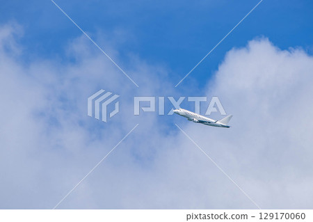 Airplane flying blue sky Airplane flying blue sky 129170060