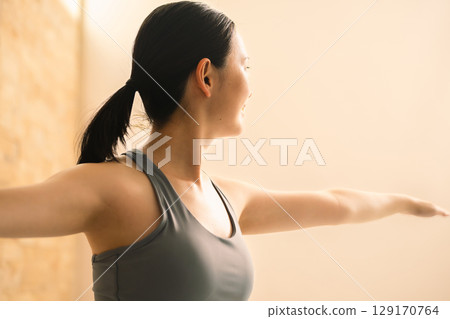 Young woman doing hot yoga beauty image Young woman doing hot yoga beauty image 129170764
