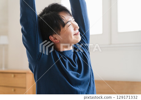 A young man having a pleasant morning Lifestyle image A young man having a pleasant morning Lifestyle image 129171332