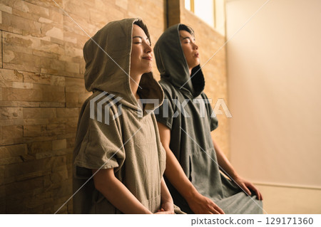 Young couple sweating in the sauna Beauty image Young couple sweating in the sauna Beauty image 129171360