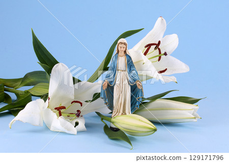 Assumption of Virgin Mary with White Lilies on Blue Background Assumption of Virgin Mary with White Lilies on Blue Background 129171796