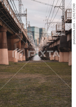 Railway tracks and buildings Railway tracks and buildings 129172590