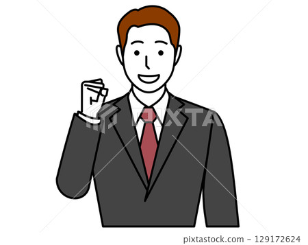 沒戴眼鏡，穿著灰色西裝，別擔心！一個男人握緊拳頭 129172624