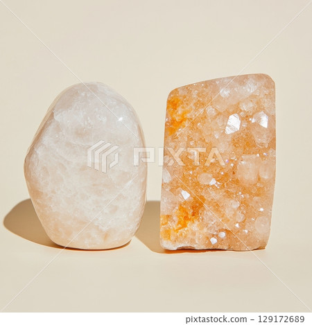 Two Elegant Natural Crystals on Soft Beige Background for Display 129172689