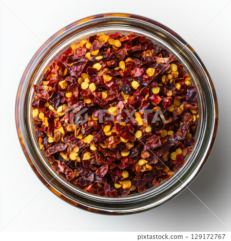 Dried Red Chili Flakes in Glass Jar for Culinary Use and Decoration 129172767