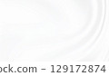 Smoothly flowing white fabric background 129172874
