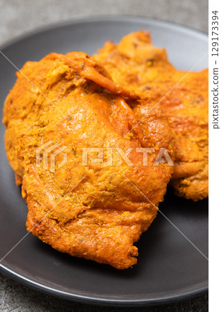 Delicious tandoori chicken Delicious tandoori chicken 129173394