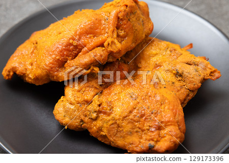 Delicious tandoori chicken Delicious tandoori chicken 129173396