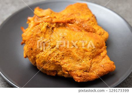 Delicious tandoori chicken 129173399