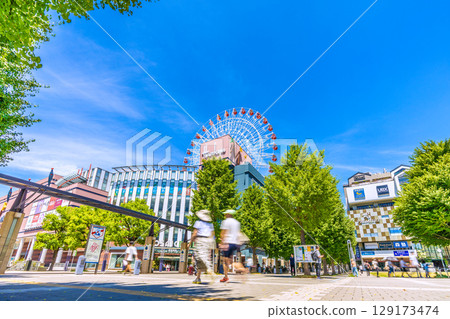 Yokohama cityscape in August, Japan. View of Center-Kita Station, Tsuzuki Hankyu, Ferris wheel, etc. Yokohama cityscape in August, Japan. View of Center-Kita Station, Tsuzuki Hankyu, Ferris wheel, etc. 129173474