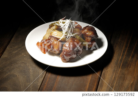 Hot sweet and sour pork with black vinegar Hot sweet and sour pork with black vinegar 129173592