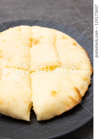 delicious cheese naan 129173687