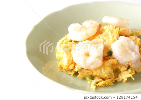Chinese stir-fried shrimp and eggs photographed on a white background 129174154