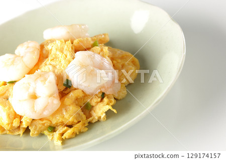 Chinese stir-fried shrimp and eggs photographed on a white background Chinese stir-fried shrimp and eggs photographed on a white background 129174157