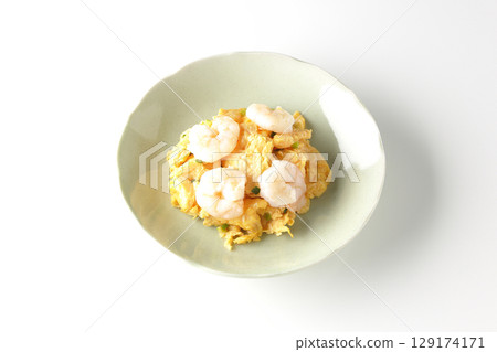 Chinese stir-fried shrimp and eggs photographed on a white background 129174171