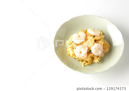 Chinese stir-fried shrimp and eggs photographed on a white background Chinese stir-fried shrimp and eggs photographed on a white background 129174173