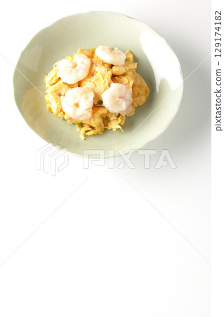 Chinese stir-fried shrimp and eggs photographed on a white background 129174182
