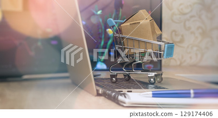 Online Shopping and E-Commerce Parcel Concept 129174406