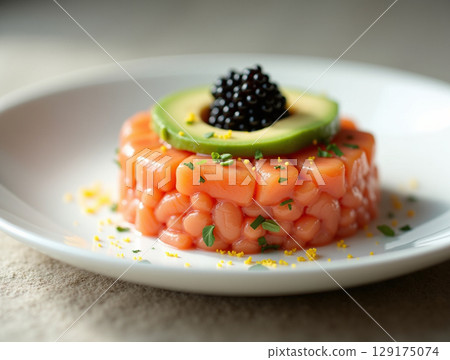 Elegant Salmon Tartare with Black Caviar, Avocado, and Herbs 129175074