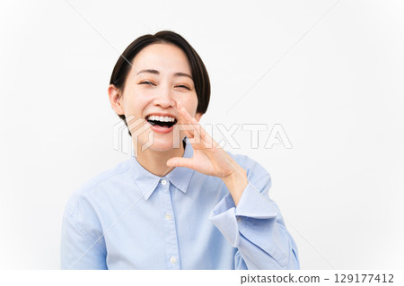 Woman wearing a long-sleeved shirt Woman wearing a long-sleeved shirt 129177412