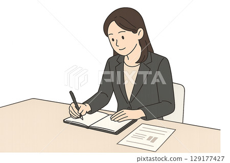 A female employee taking notes while participating in an internal meeting 129177427