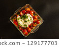 Tomato and cheese marinade 129177703