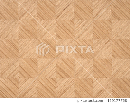 Symmetrical parquet veneer showcasing the artistry of wood patterns Symmetrical parquet veneer showcasing the artistry of wood patterns 129177768