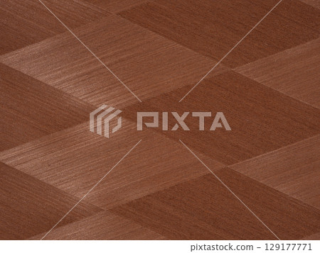 Rich mahogany veneer in a herringbone design with a luxurious polished finish 129177771