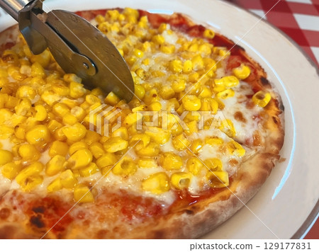 Delicious pizza with lots of corn Delicious pizza with lots of corn 129177831