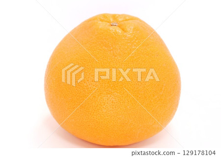 Whole grapefruit on a light background 129178104