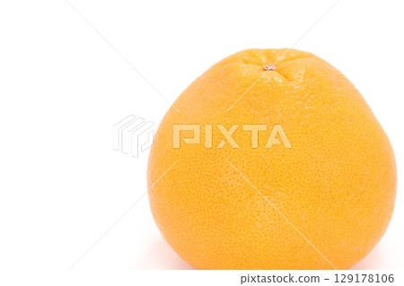 Whole grapefruit on a light background 129178106