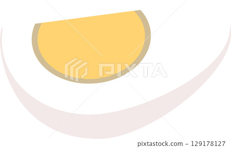 a sliced hard-boiled egg. boiled egg slice with yellow yolk and white shell 129178127