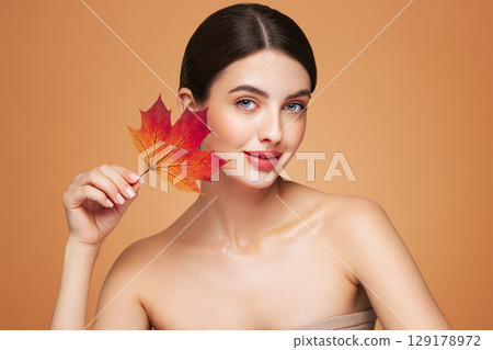 Autumn portrait of beautiful woman with clean fresh skin 129178972
