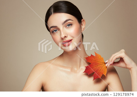 Autumn portrait of beautiful woman with clean fresh skin 129178974