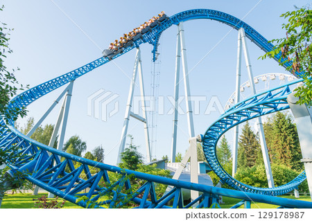 Roller coaster in the amusement park 129178987