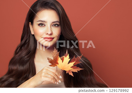 Autumn portrait of beautiful woman with clean fresh skin Autumn portrait of beautiful woman with clean fresh skin 129178992