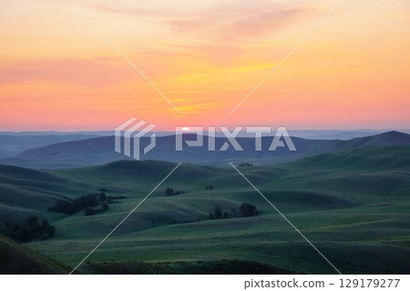 sun disk is setting in the mountains sun disk is setting in the mountains 129179277
