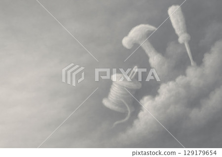 Clouds in the shape of instruments in the sky. Space for text. 129179654