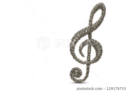 Treble clef twisted from metal wire. Space for text. Treble clef twisted from metal wire. Space for text. 129179733