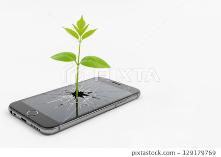 A green sprout sprouts through the broken smartphone screen. Space for text. 129179769