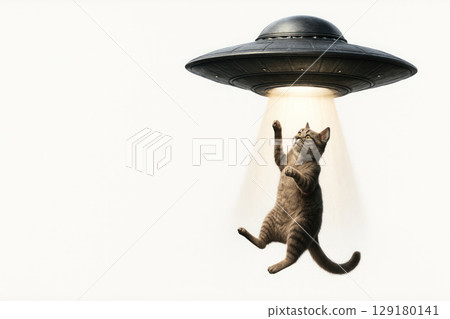 A cat that is kidnapped by a flying saucer. Space for text. 129180141